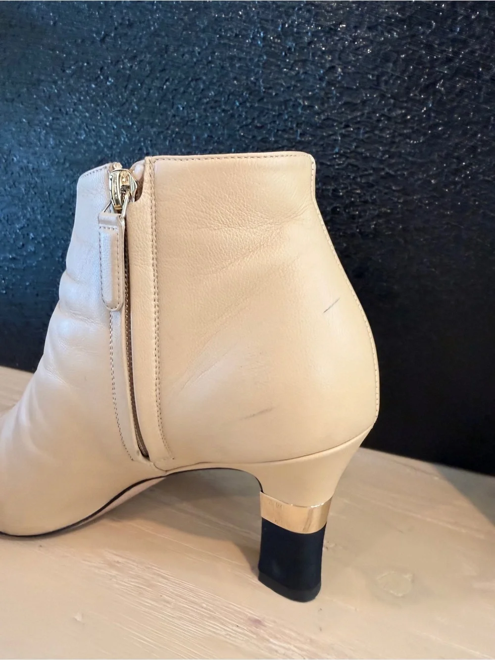 CHANEL Beige Leather Ankle Boots with Black Cap Toe